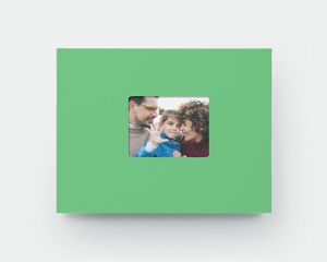 Fotoboek met venster in de kaft